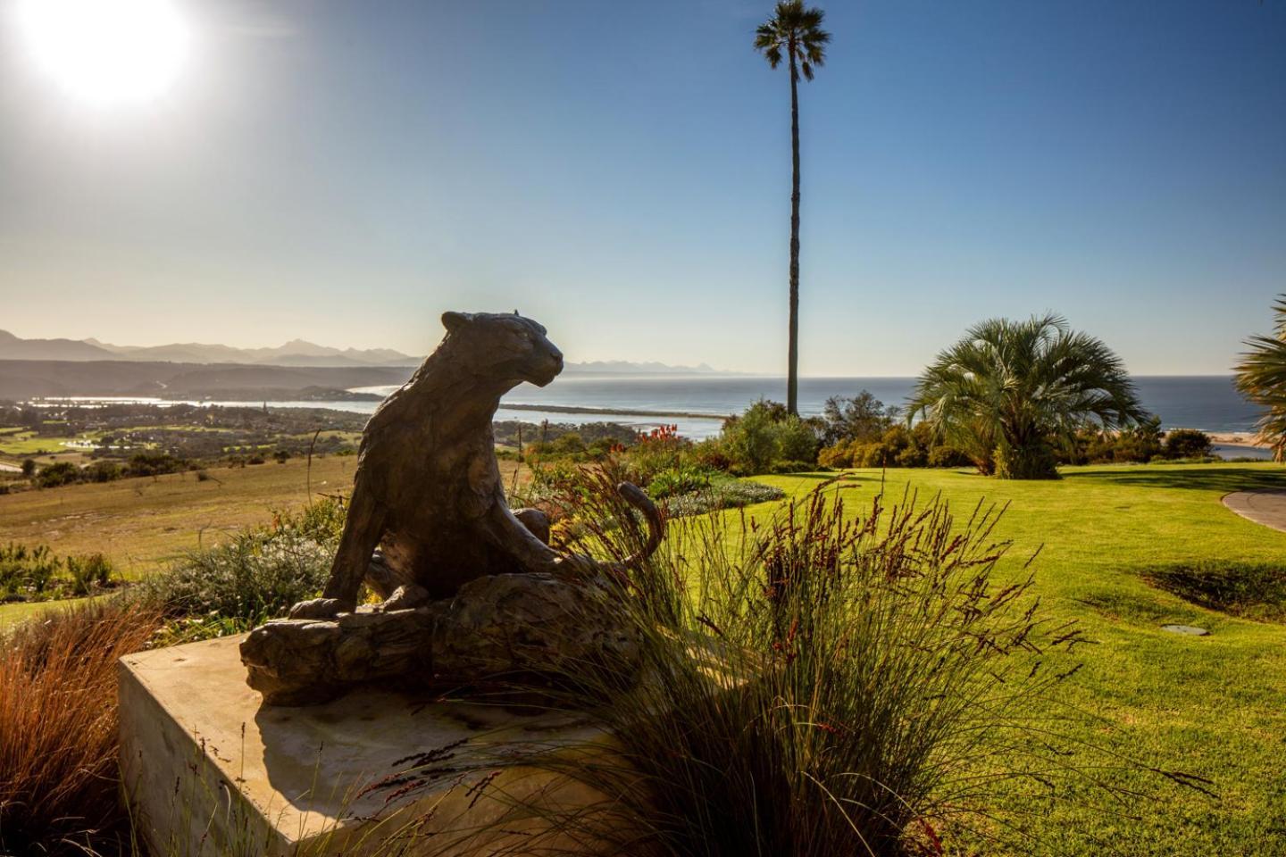 Sky Villa Boutique Hotel By Raw Africa Collection Plettenberg Bay Exterior photo The Bobcat statue at the entrance of the school